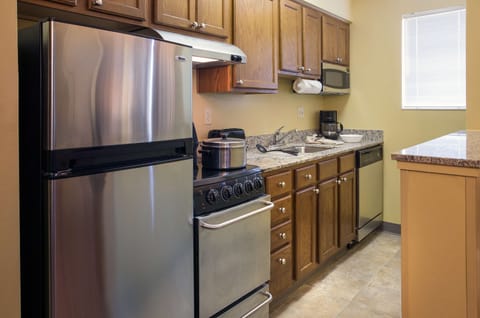 Suite, Multiple Beds (Two Bedroom) | Private kitchenette | Fridge, microwave, oven, stovetop