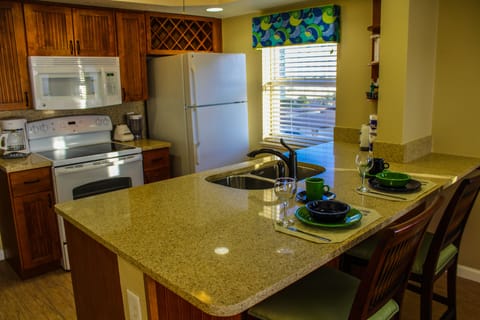 Apartment, 2 Bedrooms, Partial Ocean View | Private kitchen | Microwave, cookware/dishes/utensils