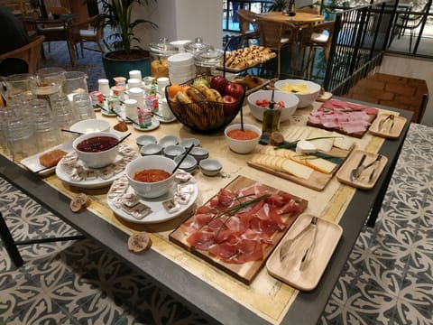 Daily buffet breakfast (EUR 14 per person)
