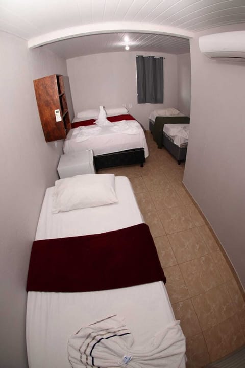 Standard Quadruple Room, Non Smoking | Minibar, blackout drapes, free WiFi, bed sheets