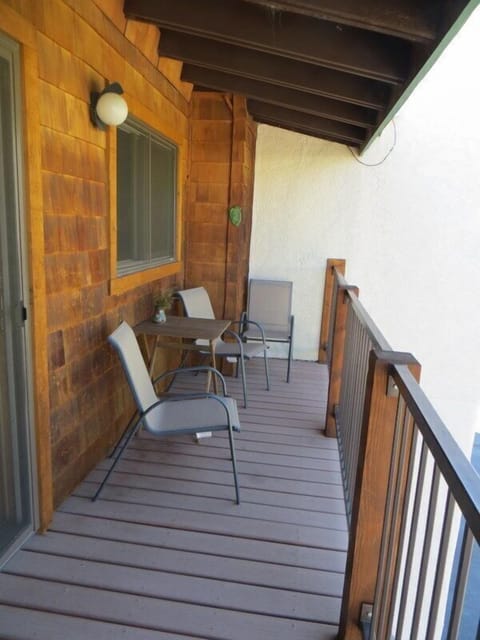 Deck with deck chairs and table.