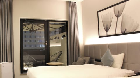 Twin Room with Balcony, Non Smoking | Premium bedding, down comforters, blackout drapes, free WiFi