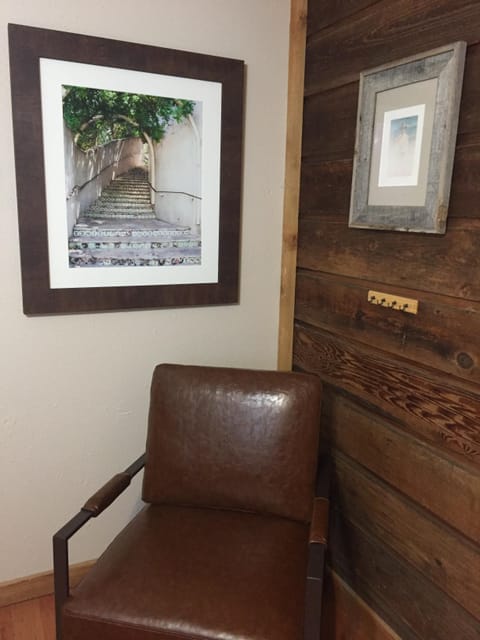 Primary bedroom, a place to sit down to put your shoes on.  