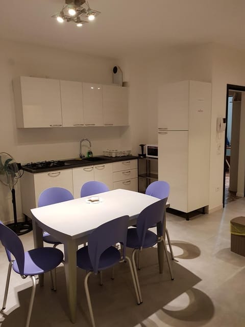 Fridge, stovetop, espresso maker, coffee/tea maker