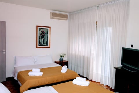 Family Room, Private Bathroom | Free WiFi, bed sheets
