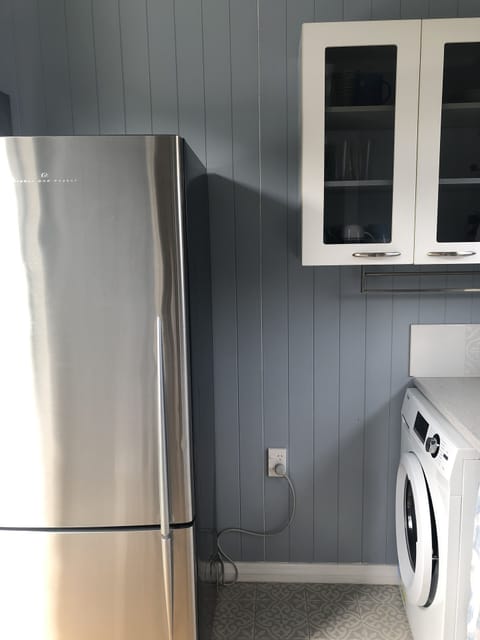 2 fridge/freezers, 1 for drinks plus front loader washing machine are available.