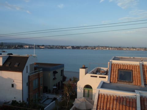 Enjoy views of tranquil Sail Bay from the roof top deck.