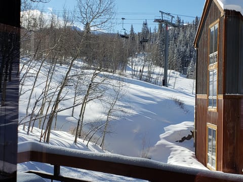 View of Lift 1 Chondola and Meadows Run from deck