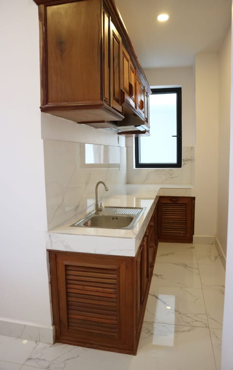 Three Bed Room Residence Suite | Private kitchen | Fridge, microwave, stovetop, coffee/tea maker