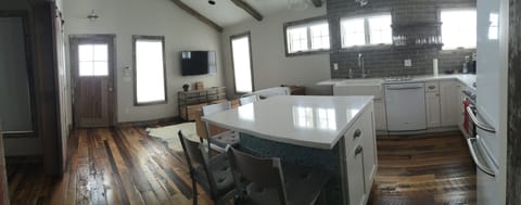 panorama view of kitchen/living & dining
