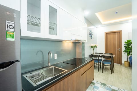 Apartment, Balcony | Private kitchenette | Fridge, stovetop, electric kettle, rice cooker