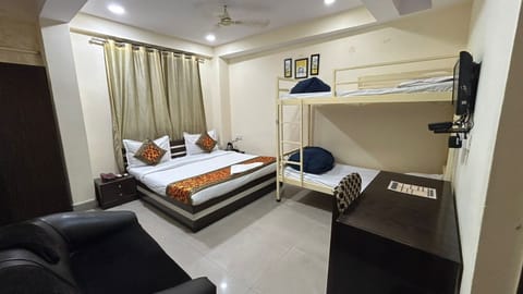 Deluxe Quadruple Room | 2 bedrooms, premium bedding, in-room safe, individually decorated