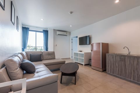 Suite, 1 King Bed, Garden View (Suite One Bedroom Garden View) | Living area | 42-inch Smart TV with cable channels, TV