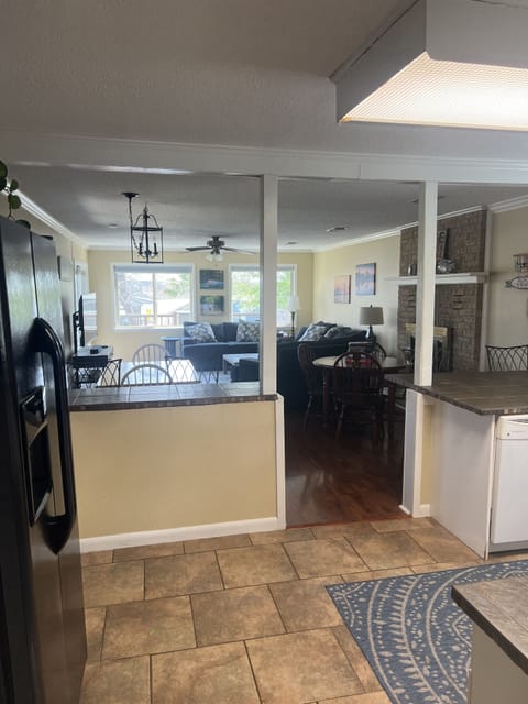 Kitchen, dining, and living room.