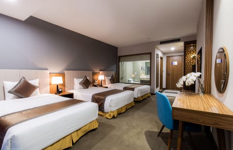 Deluxe Triple Room | Premium bedding, minibar, in-room safe, individually decorated