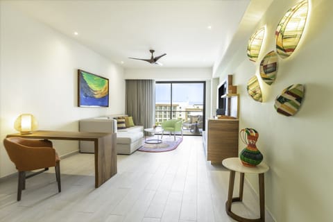 Club Suite, 1 Bedroom (Master) | Living room | 42-inch flat-screen TV with cable channels, TV, iPod dock