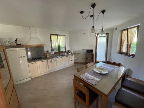 Suite | Private kitchen | Stovetop, electric kettle, cookware/dishes/utensils