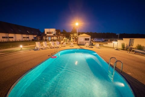 Seasonal outdoor pool, open 10:00 AM to 10:00 PM, sun loungers