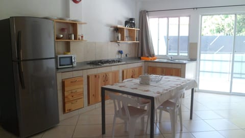 Family Apartment, 2 Bedrooms, Courtyard View | Private kitchen | Full-size fridge, microwave, stovetop, coffee/tea maker