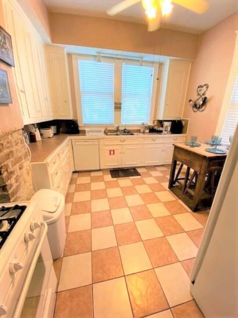 Big Kitchen with original 1914 cabinets! We have all of the cooking supplies!