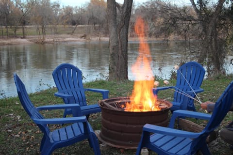Enjoy a fire by the river