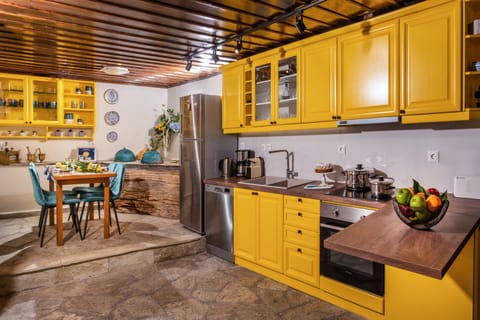 Villa, 4 Bedrooms (Villa Evridiki) | Private kitchen | Full-size fridge, oven, stovetop, dishwasher