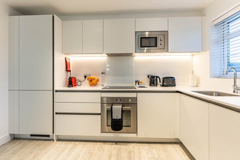 One Bedroom Lux Apartment  | Private kitchen | Full-size fridge, microwave, oven, dishwasher