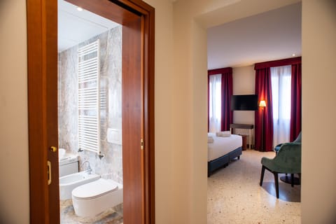 Deluxe Room | Premium bedding, down comforters, in-room safe, blackout drapes