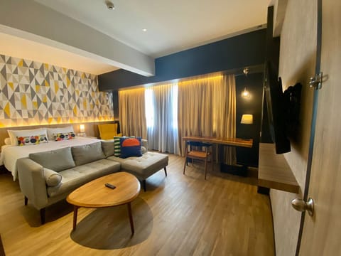 Junior Suite, 1 Double Bed | Minibar, in-room safe, desk, soundproofing