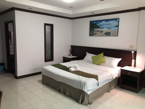 Deluxe Double Room, Balcony | In-room safe, desk, laptop workspace, blackout drapes