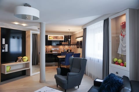 Deluxe Apartment (Istanbul) | Living room | 32-inch flat-screen TV with cable channels, TV