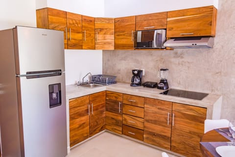 Superior Apartment, Multiple Beds, Non Smoking | Private kitchen | Full-size fridge, microwave, stovetop, cookware/dishes/utensils