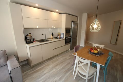 Luxury Apartment, Balcony, City View | Private kitchen | Full-size fridge, microwave, oven, stovetop