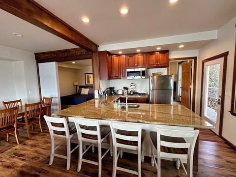 Full kitchen, propane gas stove & oven, toaster, microwave, coffee, tea & more!