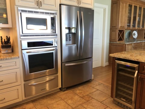 Kitchen with New Refrigerator and Wine Cooler