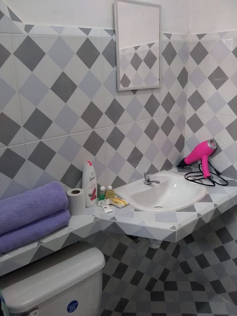 Double Room, 2 Queen Beds | Bathroom | Combined shower/tub, free toiletries, hair dryer, towels