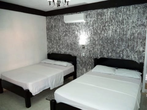 Standard Triple Room, Multiple Beds | In-room safe, bed sheets