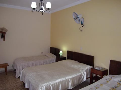 Standard Triple Room, Multiple Beds, Non Smoking | Iron/ironing board, bed sheets