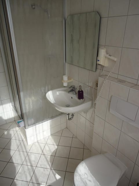 Shower, free toiletries, hair dryer, towels