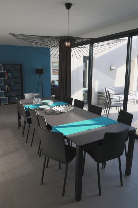 Living area opening onto the terrace and pool