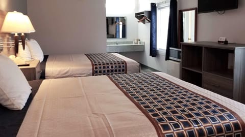 Standard Room, 2 Queen Beds | Desk, iron/ironing board, free WiFi, bed sheets