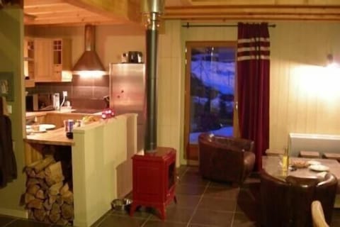 Kitchen opening onto the living room Panoramic terrace access