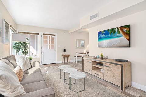 This 1bed/1ba rear downstairs cottage makes for the perfect beach getaway!