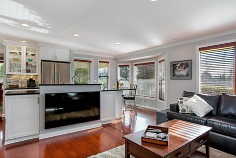 Our open concept connects the kitchen to one of our two living rooms. 