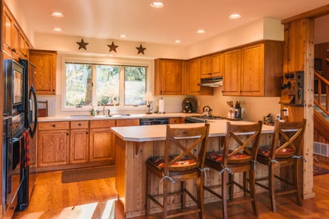 Kitchen located on the main floor with breakfast bar.