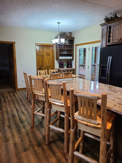 Open Floorplan includes a Kitchen Island with Seating