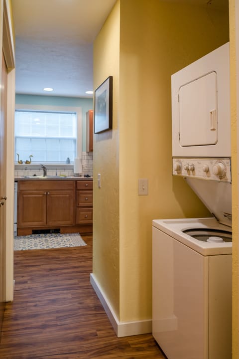 Stacked washer/dryer for your comvenience. We even provide the soap!