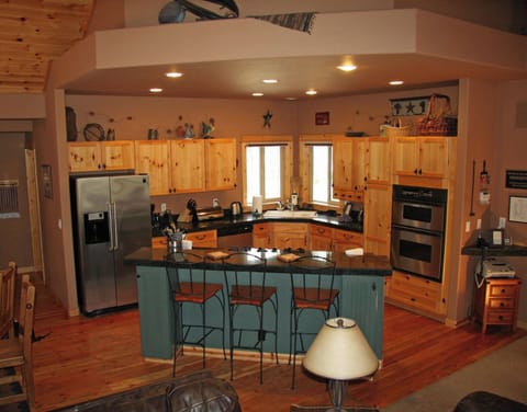 Bright well equipped kitchen open to the Great Room. Seating for 3.