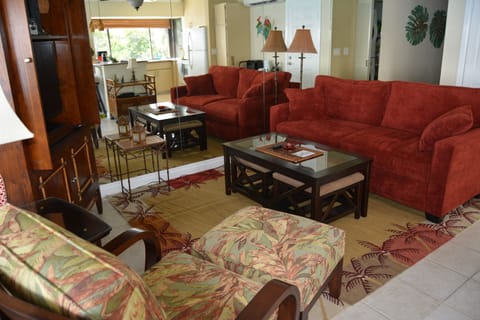 Two pull out ottoman under coffee table
