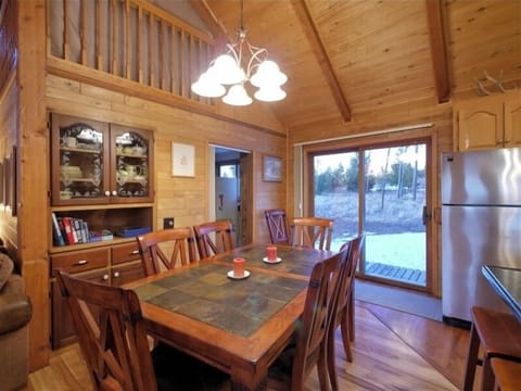 Dining room: seats 8 (w/ leaf) & 3 at island. Glass door to back yard.